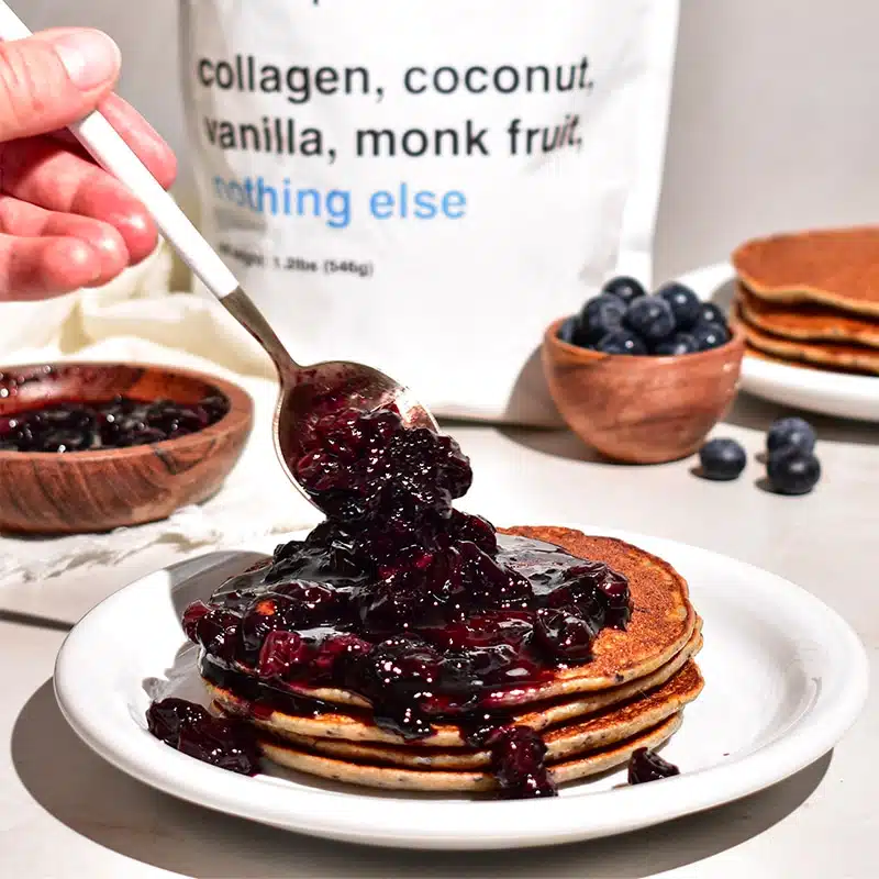 protein-powder-pancakes a woman making protein powder pancakes with drink wholesome protein powder